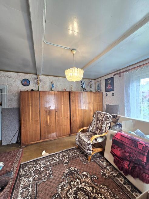 Piękne siedlisko z dwoma drewnianymi domami