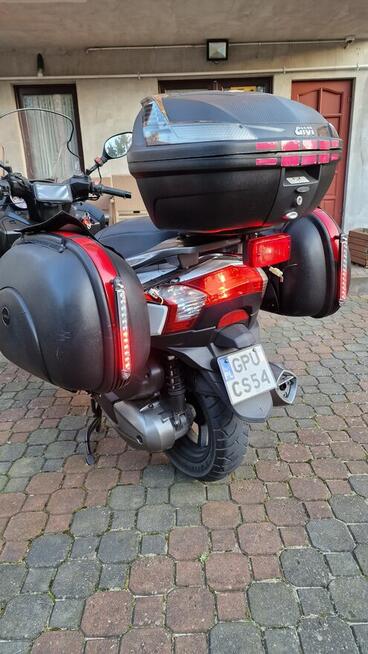 Kymco Downtown 300i, kufry boczne, Led, KAT B