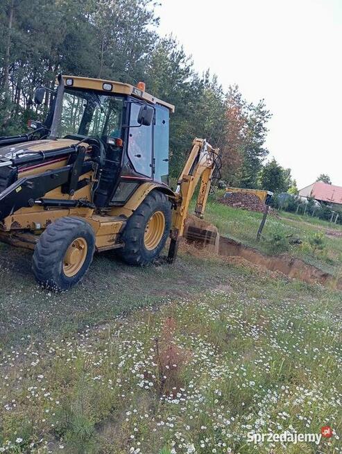 Usługi koparko-ładowarką (CAT 428D)