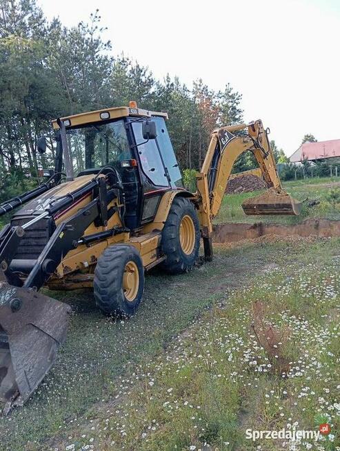 Usługi koparko-ładowarką (CAT 428D)