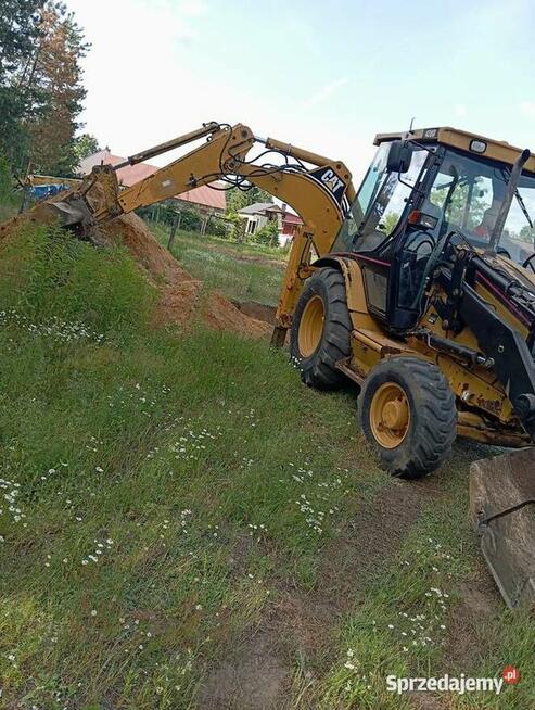 Usługi koparko-ładowarką (CAT 428D)
