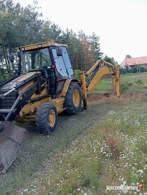 Usługi koparko-ładowarką (CAT 428D)