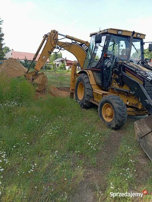 Usługi koparko-ładowarką (CAT 428D)