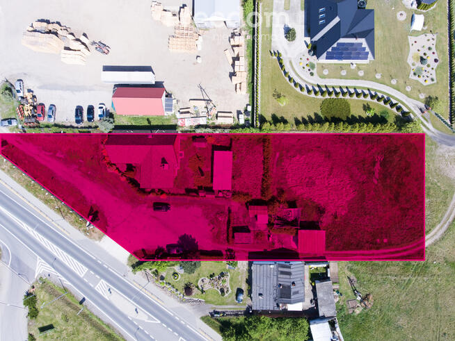 Działka zabudowana budynkiem drewnianym