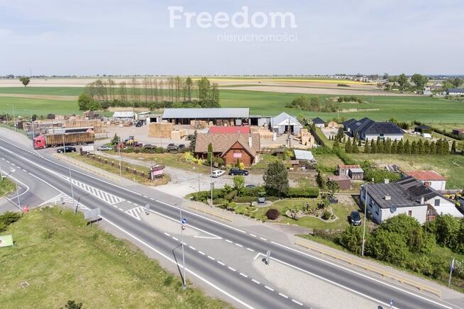 Działka zabudowana budynkiem drewnianym