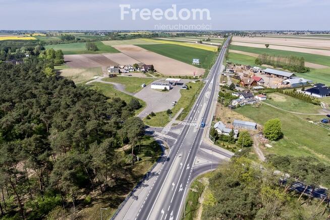 Działka zabudowana budynkiem drewnianym