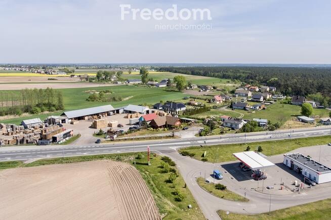 Działka zabudowana budynkiem drewnianym