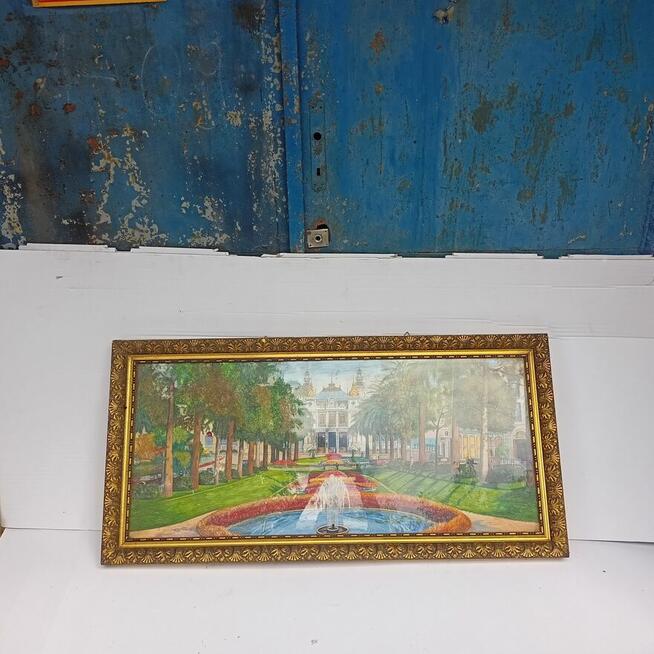 Obraz w złotej ramie