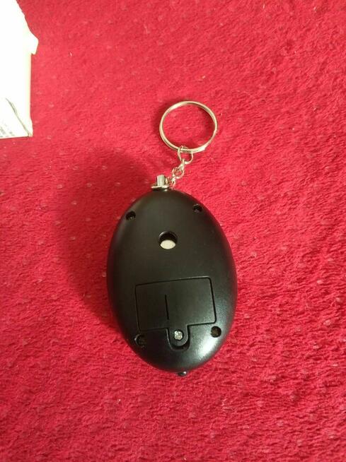 Alarm Bezpieczeństwa Osobisty Kieszonkowy Torebkowy Lampką