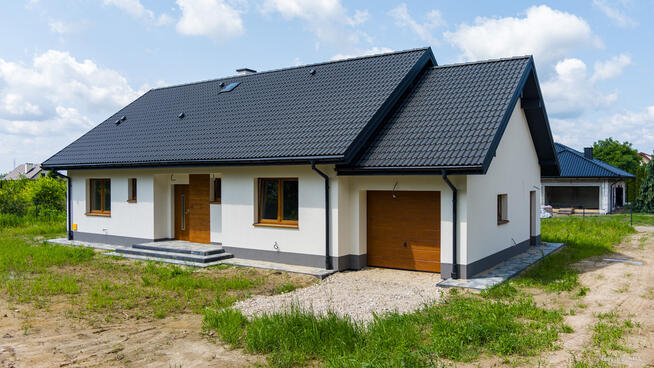 Nowy dom parterowy 128 m2 / 10,50 ara