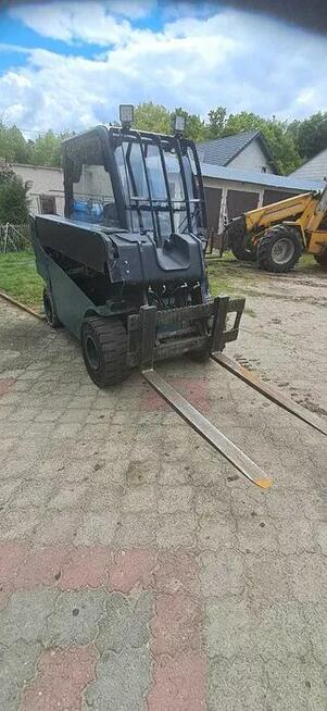 Wózek widłowy teleskopowy ładowarka JCB TLT25D widły łyżka c