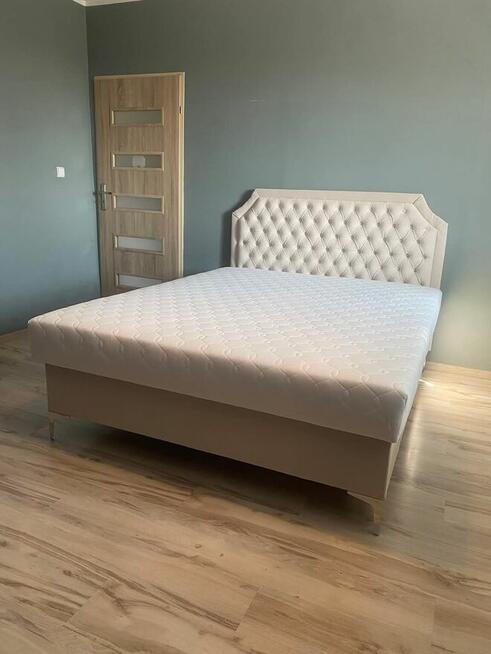 Łóżka tapicerowane z pojemnikiem