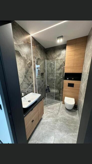 Łazienki Remonty Wykończenia wnętrz Montaż drzwi i okien