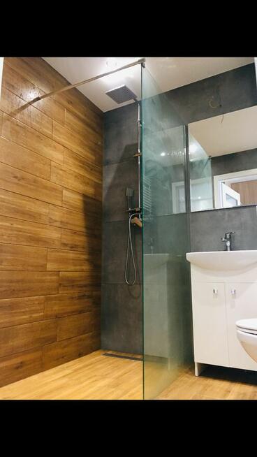 Łazienki Remonty Wykończenia wnętrz Montaż drzwi i okien