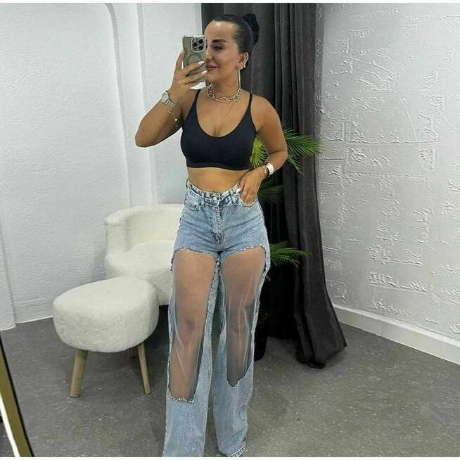 Designerskie jeansowe z przezroczystymi panelami na kolanach