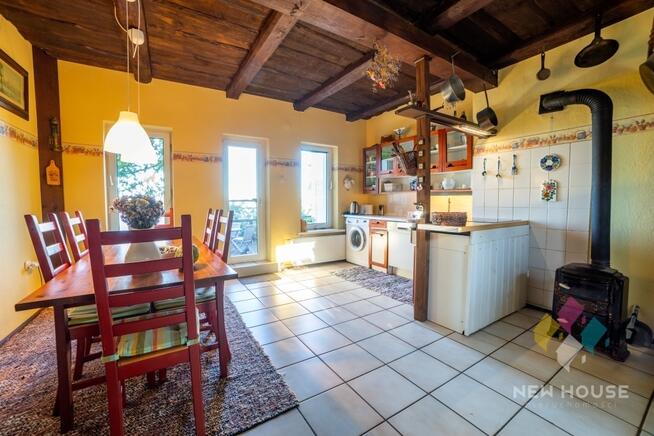 Stare Sady, dom z linią brzegową jeziora Tałty