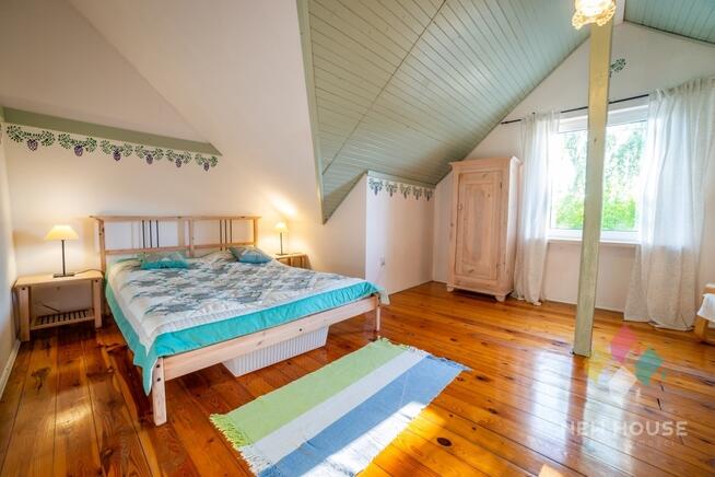 Stare Sady, dom z linią brzegową jeziora Tałty