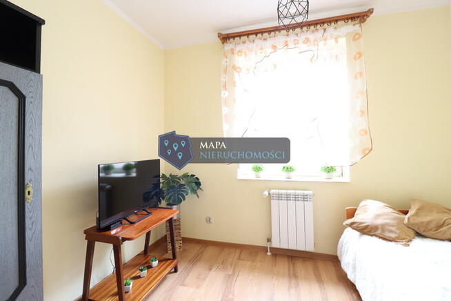 Dwurodzinny dom za miastem z fotowoltaiką