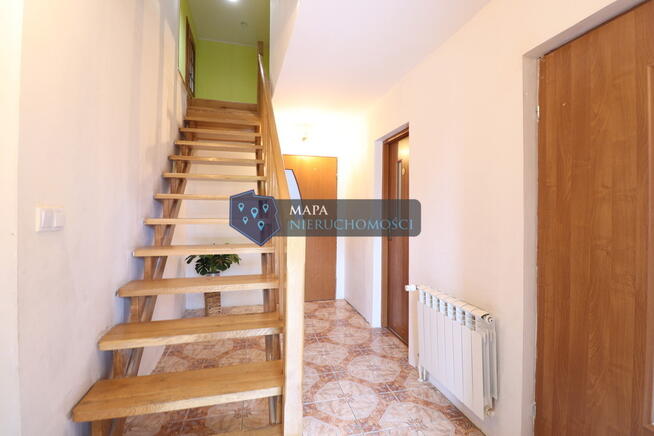 Dwurodzinny dom za miastem z fotowoltaiką