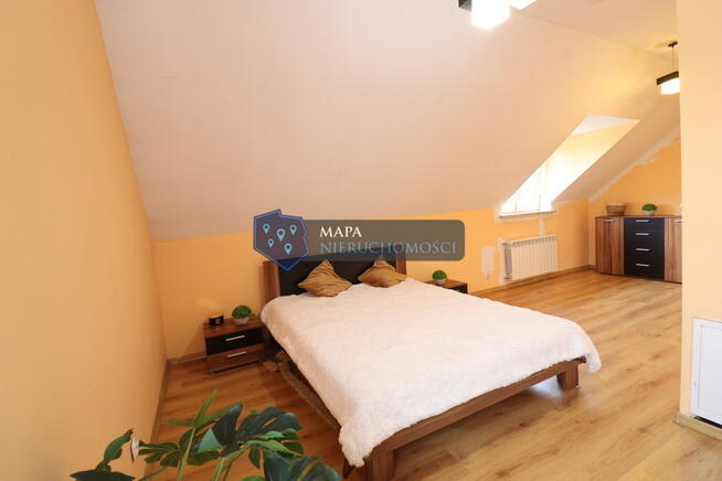 Dwurodzinny dom za miastem z fotowoltaiką