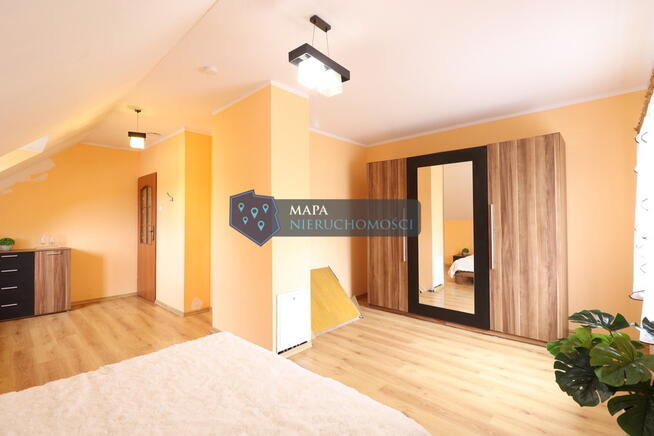 Dwurodzinny dom za miastem z fotowoltaiką