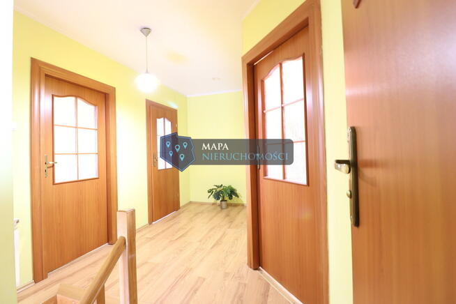 Dwurodzinny dom za miastem z fotowoltaiką