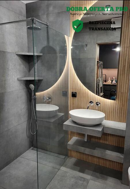 Kawalerka z balkonem i widokiem na rzekę