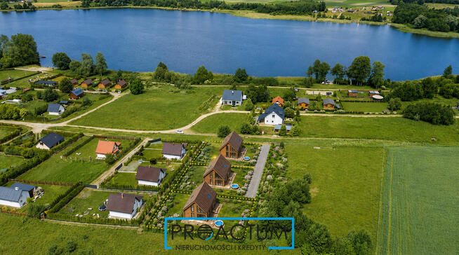 Działka nad jeziorem z fundamentem, W+E, Mazury