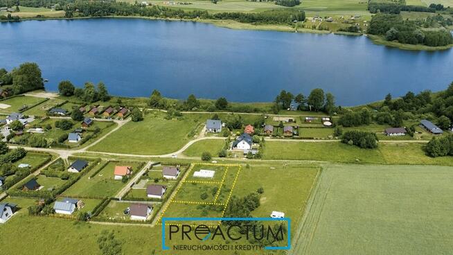 Działka nad jeziorem z fundamentem, W+E, Mazury