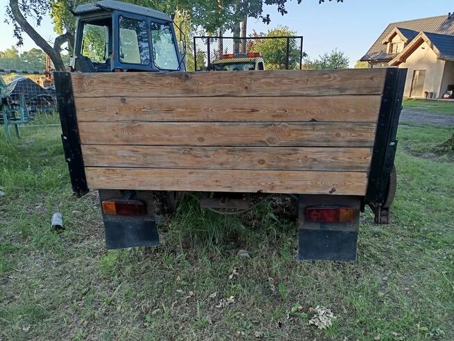 Przyczepa jedno osiowa rozszutnik