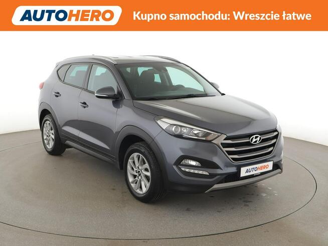Hyundai Tucson navi klima auto grzane fotele kamera i czujniki parkowania