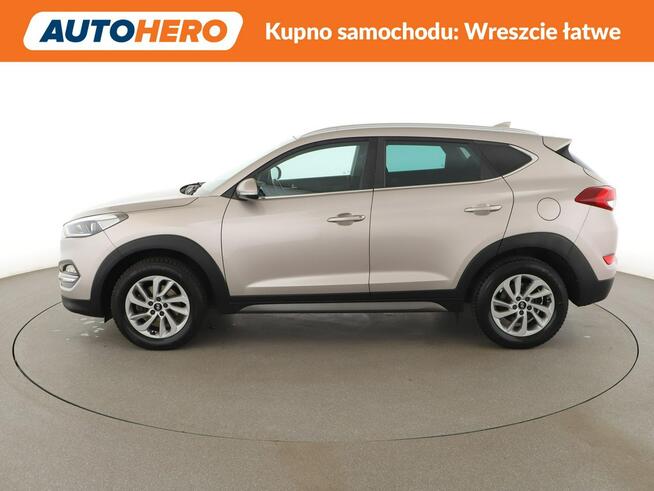 Hyundai Tucson navi klima auto grzane fotele kamera i czujniki parkowania