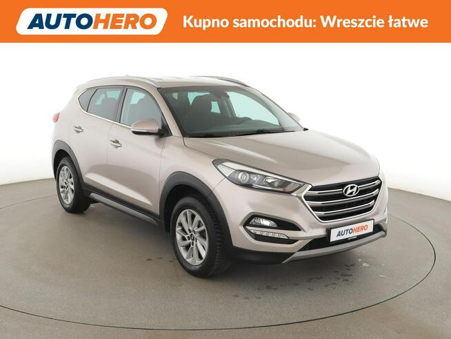 Hyundai Tucson navi klima auto grzane fotele kamera i czujniki parkowania