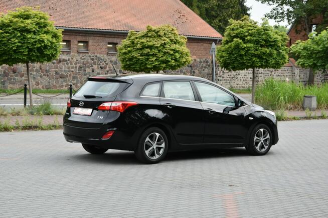 Hyundai i30 1.4 BENZYNA 99KM 2015r. Klima TEMPOMAT Bluetooth niski przebieg 179tkm