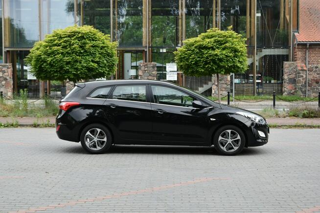 Hyundai i30 1.4 BENZYNA 99KM 2015r. Klima TEMPOMAT Bluetooth niski przebieg 179tkm