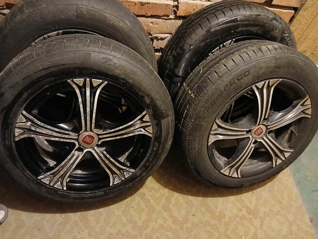 Sprzedam felgi aluminiwe z oponami