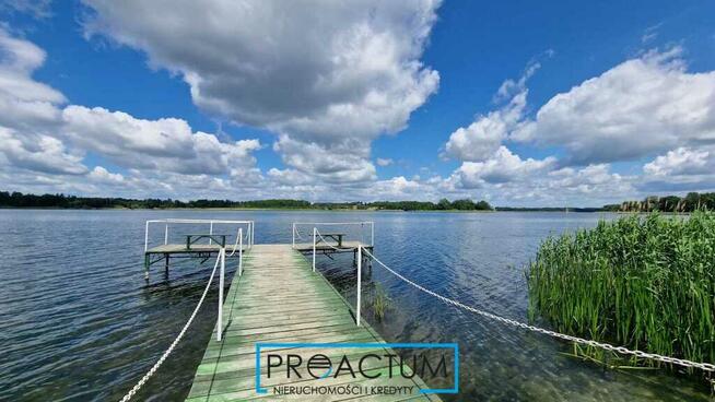 Działka nad jeziorem z fundamentem, W+E, Mazury