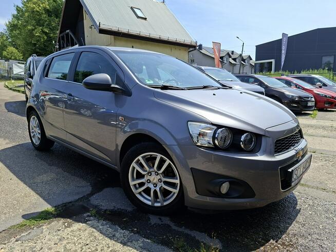 Chevrolet Aveo Klimatyzacja, Podgrz. fotele, Czujniki parkowania, Alu