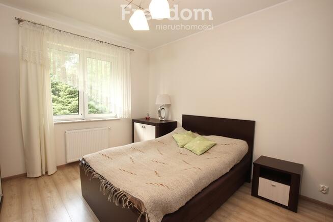 Parterowy dom z ogrodem i garażem 112,6 m²