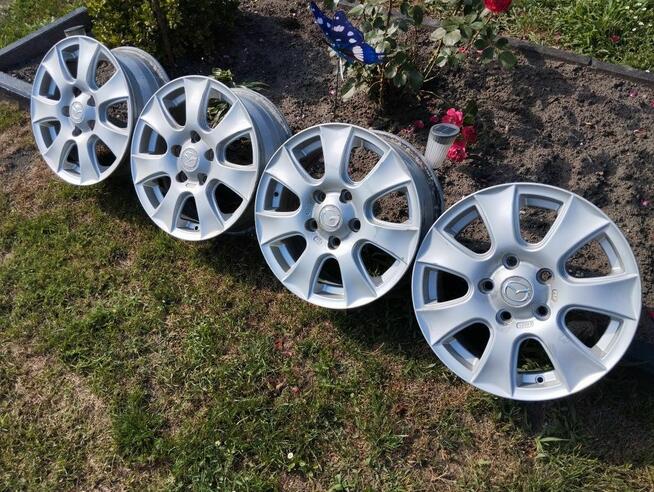 Felgi Mazda 15 5x114,3 6J ET52,5 Mazda 3 Mazda 5 67,1