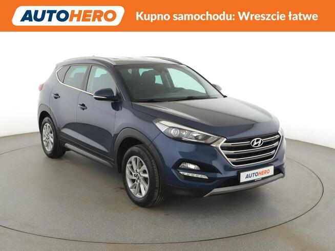 Hyundai Tucson navi klima auto grzane fotele kamera i czujniki parkowania