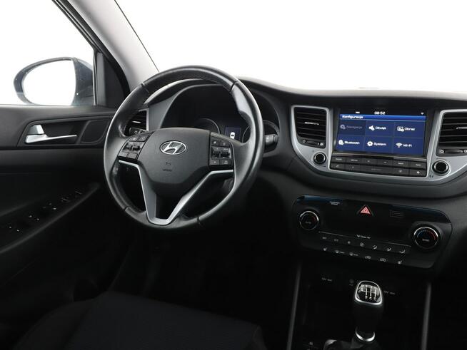 Hyundai Tucson navi klima auto grzane fotele kamera i czujniki parkowania