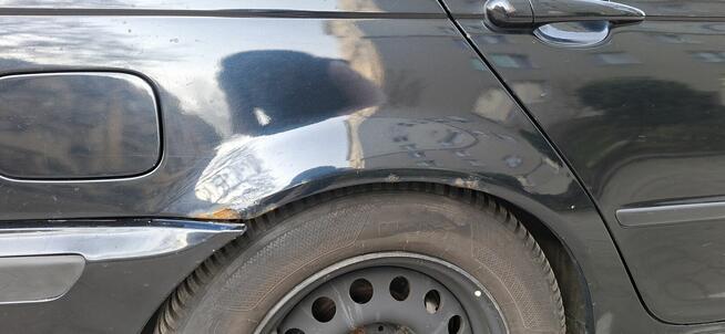 Udział w wysokości 1/2 w prawie własności w samochodzie BMW