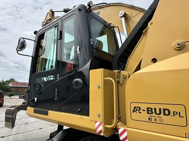 KOPARKA PRZEŁADUNKOWA CAT M313D