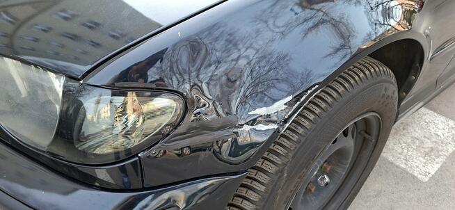 Udział w wysokości 1/2 w prawie własności w samochodzie BMW