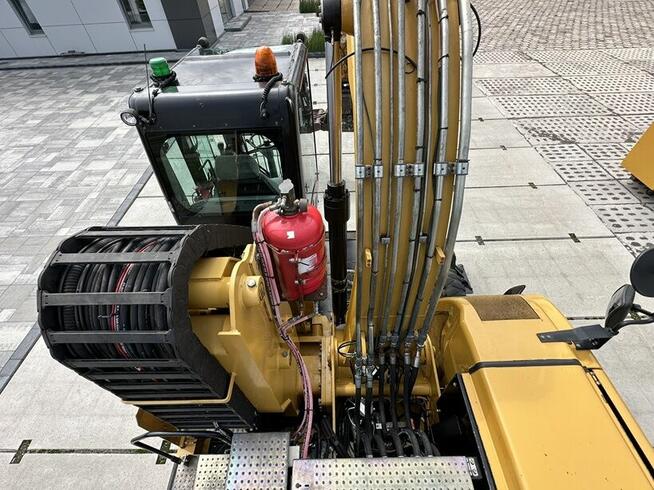 KOPARKA PRZEŁADUNKOWA CAT M313D