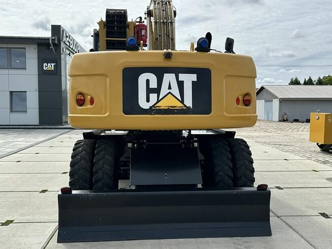 KOPARKA PRZEŁADUNKOWA CAT M313D