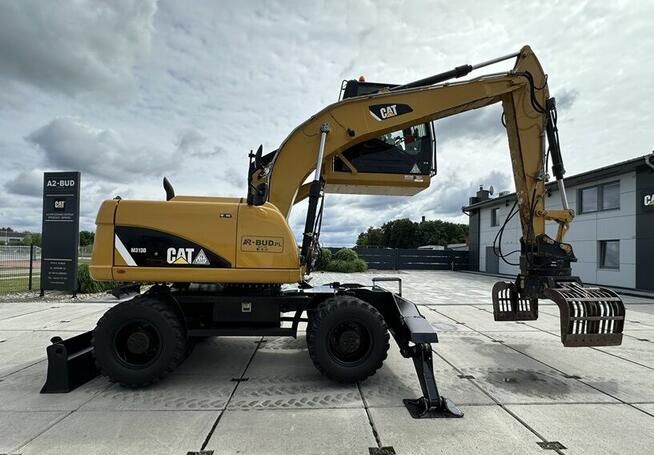KOPARKA PRZEŁADUNKOWA CAT M313D