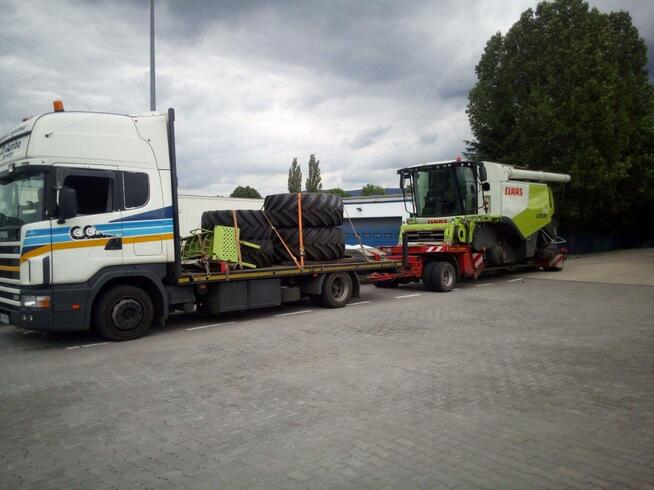 Transport niskopodłogowy niskopodwoziowy.