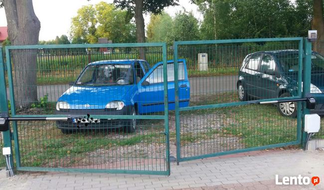 Montaż siłowników do bramy skrzydłowej